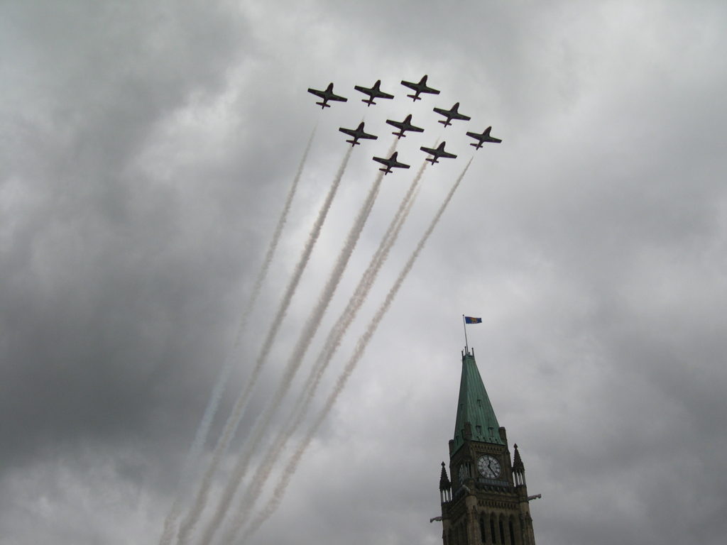 Nine Canadair Tutors in formation over Parliament Hill.