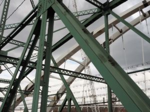 Support trusses and arches for old and new Walterdale Bridgeslevel bridges.