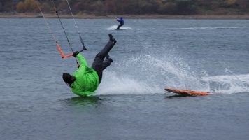 Windsurfer crashing into water