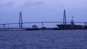 View of both towers of Arthur J. Ravenel Bridge and Yorktown aircraft carrier